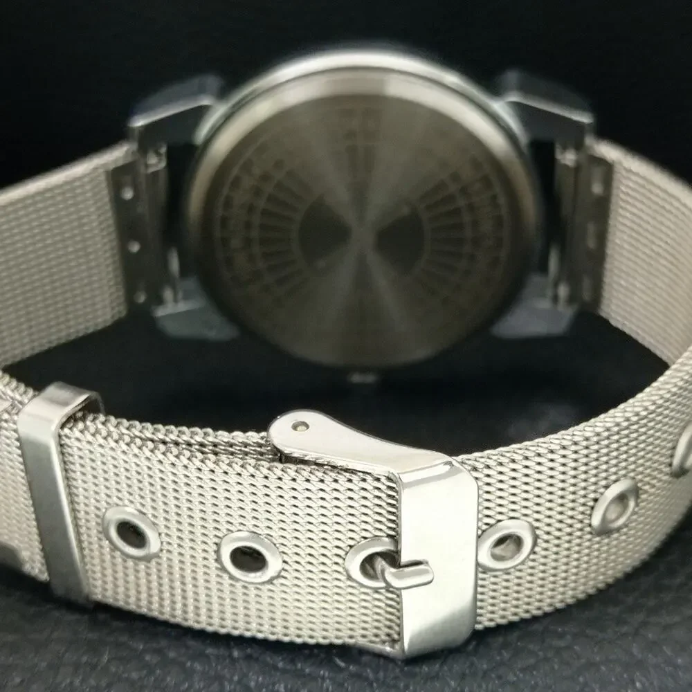 Vintage 1971 Roulette Manual Mens Silver Watch W/Steel Strap & Yellow accents